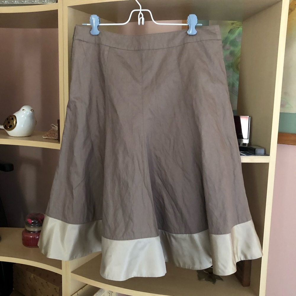 H&M  brown flared skirt with a silk stripe at the bottom, size 6